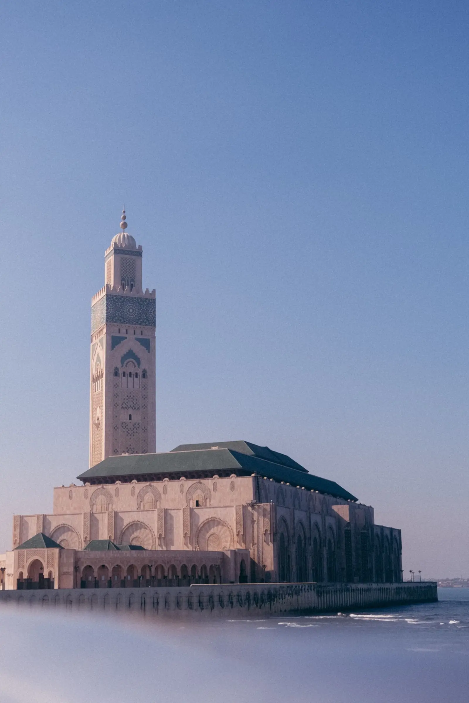 The Hassan II Mosque and its minaret by the sea